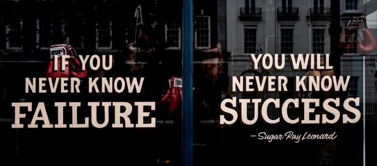 Painted window that says "If you never know failure, you will never know success."